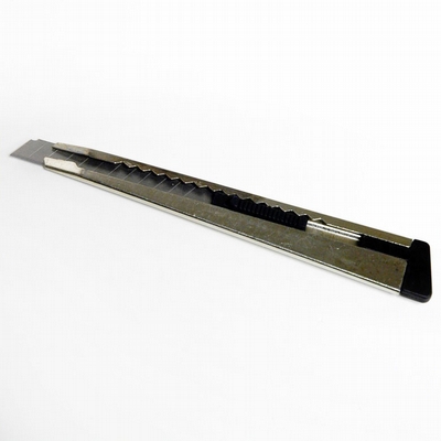 Merkloos Afbreekmes metaal 9 mm breed